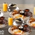 [Image: ¡Empieza tu Día en Tony Roma’s! ¡Paga $19.95 en Lugar de $39.80 por 4 Desayunos Típicos + 4 Naranjadas de 8 Oz + 4 Cafés Americanos con Refill!m]