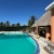 [Image: ¡Descubre un Paraíso Tropical en Playa Barra del Jiote! ¡Paga Q699 en Vez de Q1,400 por Estadía Para 2 Personas en Habitación Doble con AC + Piscinas + Jacuzzis + Playa + Traslado Exclusivo en Lancha con Recorrido Panorámico entre Manglares y Más!m]
