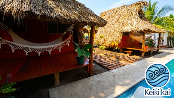 [Image: ¡Escapada Perfecta a la Playa! ¡Paga Q365 en Lugar de Q850 por 1 Noche para 2 Personas en Cabaña Tipo Hawaii con Baño Privado o Habitaciones Dobles con Baño Privado + Snacks de Desayuno + Uso de Instalaciones: Piscina, Hamacas y Más!m]