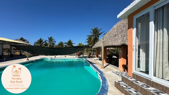 [Image: ¡Descubre un Paraíso Tropical en Playa Barra del Jiote! ¡Paga Q699 en Vez de Q1,400 por Estadía Para 2 Personas en Habitación Doble con AC + Piscinas + Jacuzzis + Playa + Traslado Exclusivo en Lancha con Recorrido Panorámico entre Manglares y Más!m]