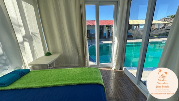 [Image: ¡Descubre un Paraíso Tropical en Playa Barra del Jiote! ¡Paga Q699 en Vez de Q1,400 por Estadía Para 2 Personas en Habitación Doble con AC + Piscinas + Jacuzzis + Playa + Traslado Exclusivo en Lancha con Recorrido Panorámico entre Manglares y Más!m]