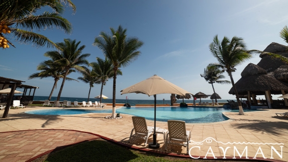 [Image: ¡Playa, Relax y Confort en el Hotel Cayman Suites! ¡Paga Q829 en Vez de Q1,046 por Estadía en Habitación Sencilla o Doble Para 2 Adultos y Hasta 2 Niños + Desayunos + Playa + Piscinas + Uso Ilimitado de Atractivas Instalaciones + Impuestos Incluidos!m]